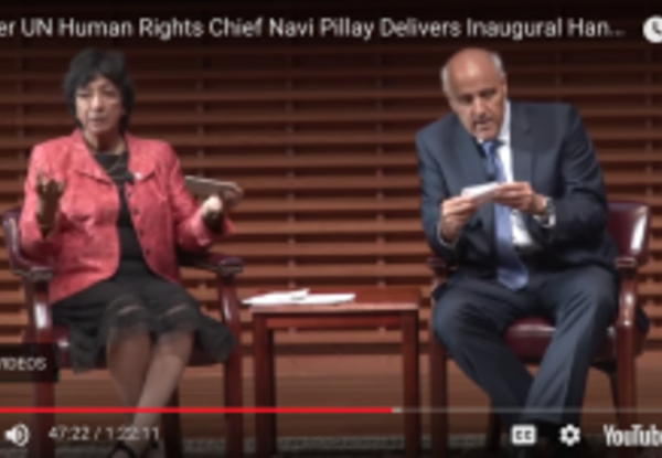 Screenshot of a center video where Navi Pillay and David Cohen sit in chairs next to each other