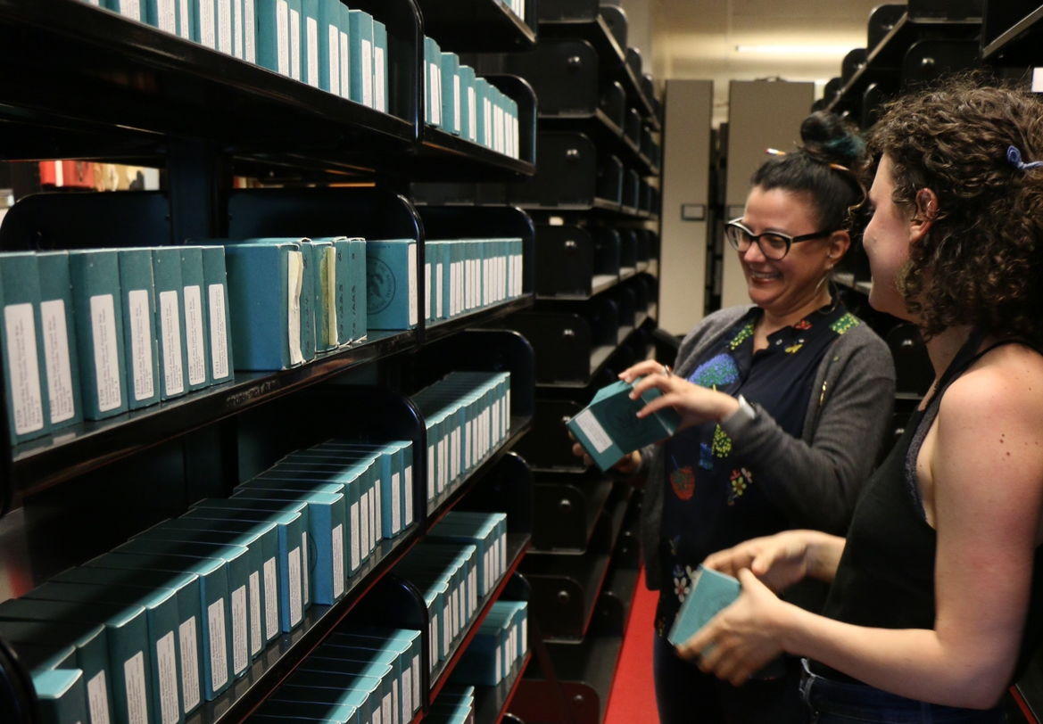 Kris, Eva and Hannah with microfilm in the library archives