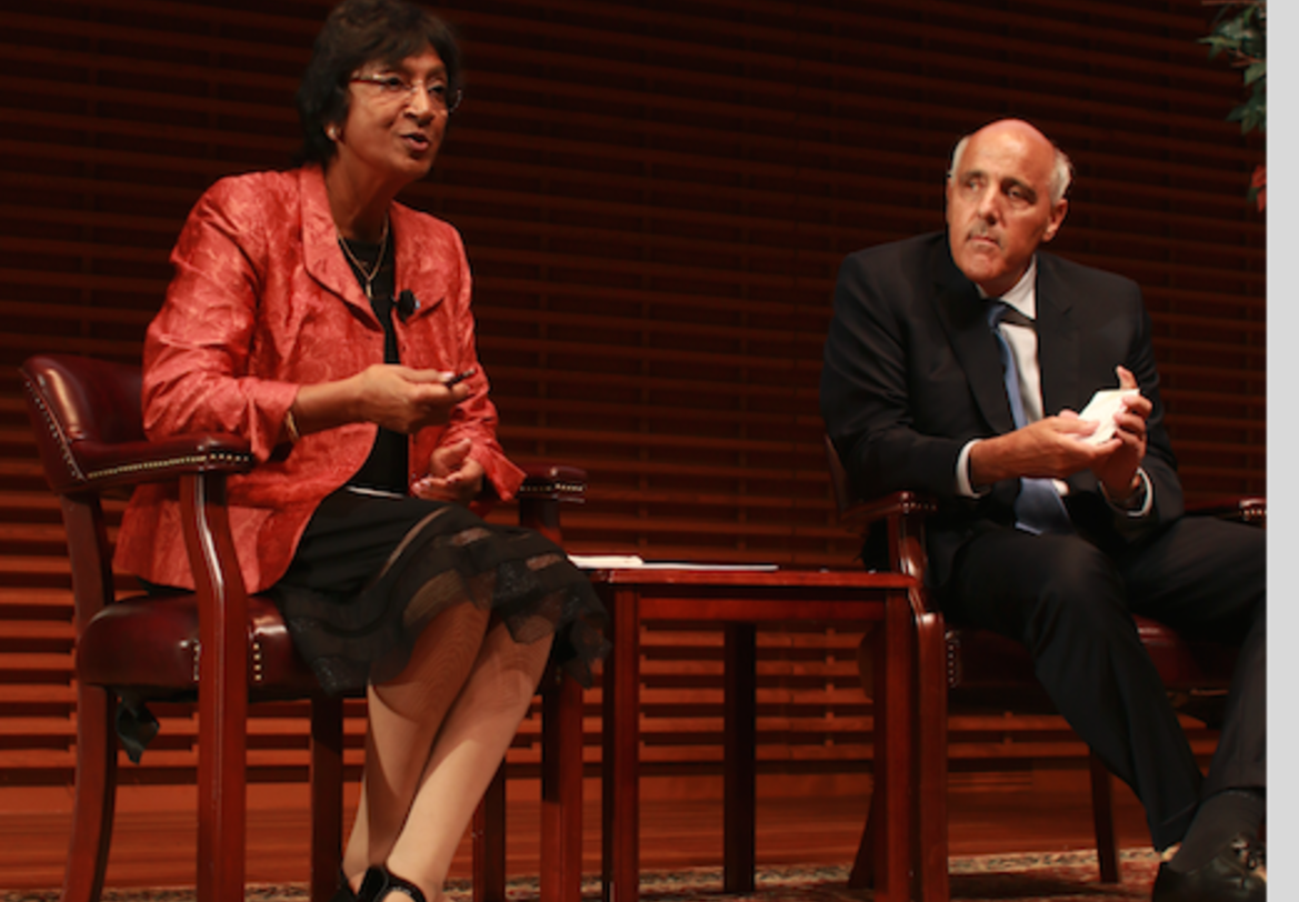 Former United Nations High Commissioner for Human Rights Navi Pillay and David Cohen sit next to each other.